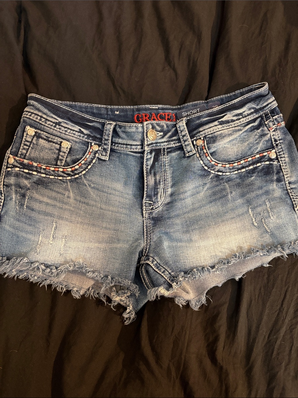 Grace Distressed Braided-Trim Blue low rise Denim Shorts